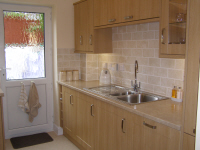 Finished kitchen installed by White Rose Plumbing